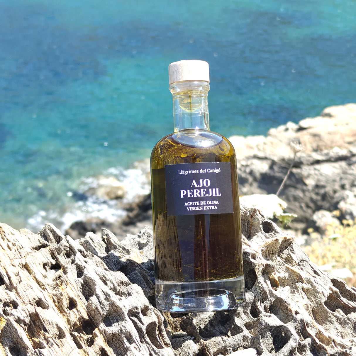 Aceite con Ajo y Perejil - Llàgrimes del Canigó by Motel Empordà